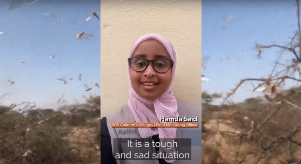 Climate change disaster relief volunteer supports children affected by natural calamities in vulnerable communities.